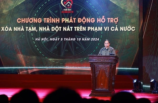  Thủ tướng Phạm Minh Chính phát biểu tại Chương trình phát động hỗ trợ xóa nhà tạm, nhà dột nát. (Ảnh: TTXVN)