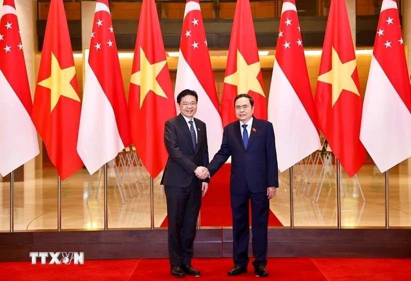 Chủ tịch Quốc hội Trần Thanh Mẫn hội kiến Thủ tướng Singapore Lawrence Wong. (Ảnh: TTXVN)