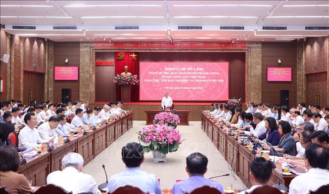   Tổng Bí thư Tô Lâm và Đoàn công tác Trung ương làm việc với Ban Thường vụ Thành ủy Hà Nội. Ảnh: TTXVN