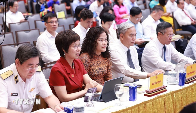   Các đại biểu tham dự Hội nghị tổng kết Chương trình và Phong trào thi đua “Cả nước chung tay xóa nhà tạm, nhà dột nát”. (Ảnh: TTXVN)