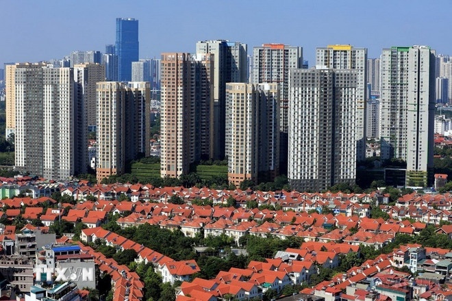 Tầm nhìn đến năm 2050, Thủ đô Hà Nội là thành phố kết nối toàn cầu, có mức sống và chất lượng cuộc sống cao. (Ảnh: TTXVN) Tầm nhìn đến năm 2050, Thủ đô Hà Nội là thành phố kết nối toàn cầu, có mức sống và chất lượng cuộc sống cao. (Ảnh: TTXVN)