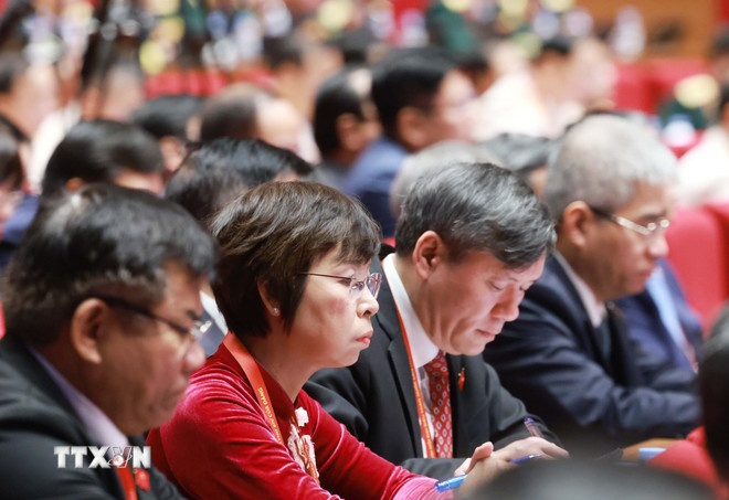 Các đại biểu dự phiên thảo luận tại hội trường về các văn kiện Đại hội, sáng 21/1. (Ảnh: TTXVN) Các đại biểu dự phiên thảo luận tại hội trường về các văn kiện Đại hội, sáng 21/1. (Ảnh: TTXVN)