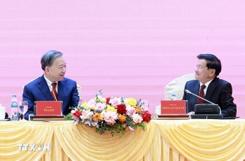 Tổng Bí thư, Chủ tịch nước Lào thông tin về kết quả Đại hội XII Đảng NDCM Lào