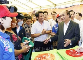 chu tich nuoc trao qua tet tang gia dinh chinh sach nguoi ngheo tai kien giang