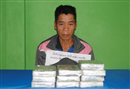 nghe an bat nguoi lao van chuyen 10 banh heroin