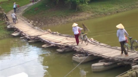 treo tinh mang tren cau phao cu nat
